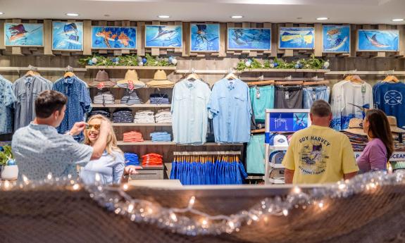Couples shopping in the retail store at Guy Harvey Resort