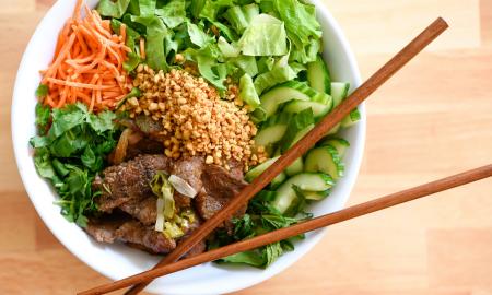 The vermicelli bowl and chopsticks placed on top