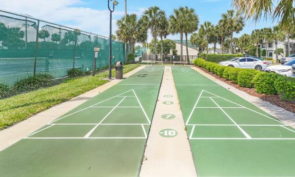 Two shuffleboard courts at Ocean Gallery are next to the tennis courts