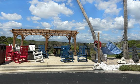 This seating area overlooks the marsh and has rockers and hammocks for relaxing