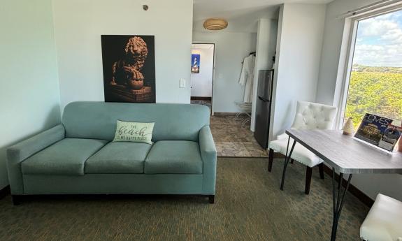 The seating area in one of the guest rooms, overlooking the beach in Vilano