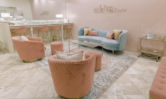 A lounge set up for the bride and her entourage