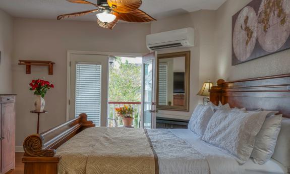 This guest room has a hot tub and a private deck 