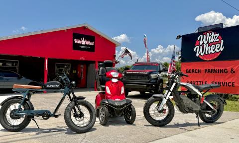 Witz Wheel shop with two ebikes and a mobility scooter in front